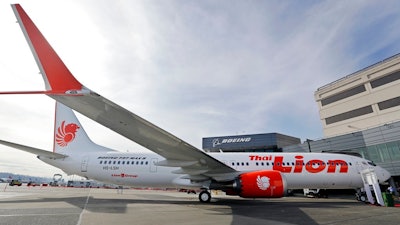 This March 21, 2018, file photo shows Boeing's first 737 MAX 9 jet at the company's delivery center before a ceremony transferring ownership to Thai Lion Air in Seattle. Boeing didn't tell airline pilots about features of a new flight-control system in its 737 MAX that reportedly is a focus of the investigation into last month's deadly crash in Indonesia, according to pilots who fly the jet in the U.S.