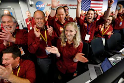 Engineers celebrate as the InSight lander touch downs on Mars in the mission support area of the space flight operation facility at NASA's Jet Propulsion Laboratory Monday, Nov. 26, 2018, in Pasadena, Calif.