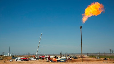 This photo taken May 24, 2018 shows a flare burning on the southwest corner of the Smith Ranch. Kenneth Smith, Inc. continues to be responsible for the grazing fees associated with the lands under the facility of which no longer grow vegetation; a necessity of the grazing lease. This is the case in all development of the lands for non-agriculture related utilization approved by the Bureau of Land Management and NM State Land Office. The actual footprint of acres lost, yet still on grazing lease responsibility is 7.3 times the what the BLM is reporting; a total of 125.41 acres.