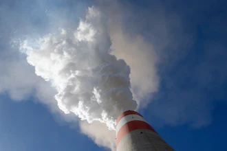 In this photo taken Wednesday, Oct. 3, 2018, smoke rises from the chimney of Serbia's main coal-fired power station near Kostolac, Serbia. Chinese companies are the world's largest investors in overseas coal plants. They are involved in the building of about a fifth of new coal-fired energy capacity around the world, mostly in the countries along its ambitious 'Belt and Road' investment program which is seen in the West as an attempt by China to globally increase its political and economic influence.