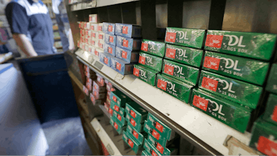 This May 17, 2018 file photo shows packs of menthol cigarettes and other tobacco products at a store in San Francisco. On Thursday, May 15, 2018, FDA Commissioner Dr. Scott Gottlieb pledged to ban menthol from cigarettes, in what could be a major step to further push down U.S. smoking rates.