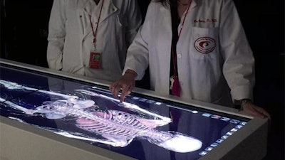 At the controls of one of two Anatomage Tables at the University of Houston College of Optometry are assistant professors of optometry Vivien Coulson-Thomas and Lisa Ostrin.