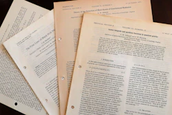 In this Friday, Oct. 19, 2018 file photo, documents and files by Stephen Hawking the personal and academic possessions of Stephen Hawking at the auction house Christies in London. A wheelchair used by Stephen Hawking has sold at auction for almost 300,000 pounds ($393,000), while a copy of the scientist's doctoral thesis fetched almost 585,000 pounds ($767,000). The motorized chair, used by the physicist after he was paralyzed with motor neuron disease, sold for 296,750 pounds in a Christie’s online auction on Thursday Nov. 8, 2018.