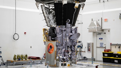 In this July 6, 2018 file photo, NASA's Parker Solar Probe sits in a clean room at Astrotech Space Operations in Titusville, Fla., after the installation of its heat shield. Parker has made its first close approach to the sun, just 2 1/2 months after liftoff. The spacecraft flew within 15 million miles (24 million kilometers) of the sun’s surface Monday night, Nov. 5. Its speed topped 213,000 miles (342,000 kilometers) an hour relative to the sun, as it penetrated the outer solar atmosphere, or corona. No spacecraft has ever gotten so close to our star.