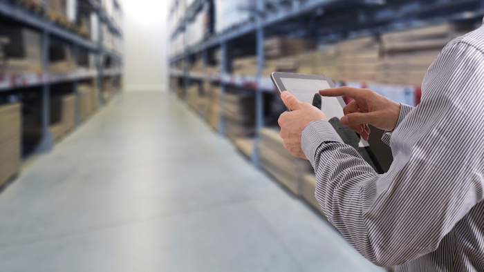 Businessman Stock Room Tablet 000063269441 Large