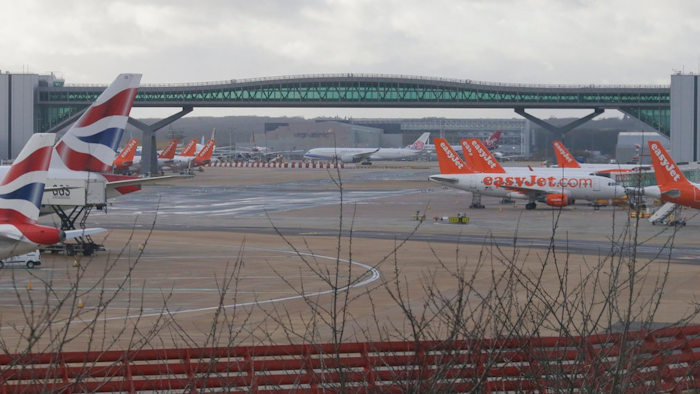 Planes are grounded at Gatwick airport, near London, as the airport remains closed with incoming flights delayed or diverted to other airports, after drones were spotted over the airfield last night and this morning, Thursday, Dec. 20, 2018. London's Gatwick Airport remained shut during the busy holiday period Thursday while police and airport officials investigate reports that drones were flying in the area of the airfield.