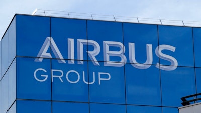 - In this May 6, 2016 file photo, the logo of the Airbus Group is pictured in Suresnes, outside Paris. Shares in Airbus are sinking on a report in Le Monde that the U.S. Department of Justice has opened an official investigation into alleged fraud by the European planemaker. Authorities in Britain and France were already investigating alleged fraud and bribery related to Airbus' use of outside consultants in commercial plane sales.