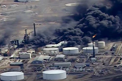 In this April 26, 2018 file image from video, smoke rises from the Husky Energy oil refinery after an explosion and fire at the plant in Superior, Wisconsin.