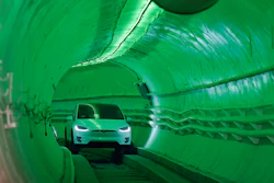 Elon Musk, co-founder and chief executive officer of Tesla Inc., arrives in a modified Tesla Model X electric vehicle during an unveiling event for the Boring Company Hawthorne test tunnel in Hawthorne, Calif., on Tuesday, Dec. 18, 2018. Musk unveiled his underground transportation tunnel on Tuesday, allowing reporters and invited guests to take some of the first rides in the revolutionary albeit bumpy subterranean tube — the tech entrepreneur's answer to what he calls 'soul-destroying traffic.'