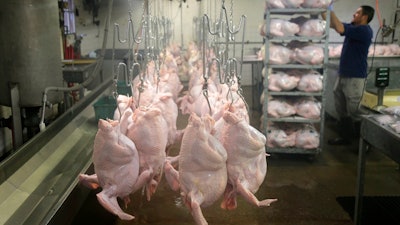 In this Nov. 13, 2018, file photo fresh turkeys are ready to be packaged at Ashley Farms in Flanders, N.J. On Tuesday, Dec. 12, the Labor Department reports on U.S. producer price inflation in November.
