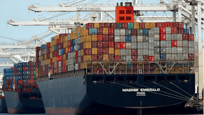 In this Thursday, July 12, 2018, file photo, the container ship Maersk Emerald is unloaded at the Port of Oakland, Calif. China has announced a 90-day suspension of tariff hikes on $126 billion of U.S. cars, trucks and auto parts following its cease-fire in a trade battle with Washington that threatens global economic growth.