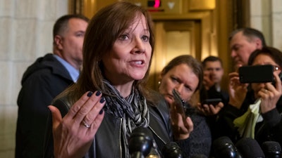 General Motors CEO Mary Barra speaks to reporters after a meeting with Sen. Sherrod Brown, D-Ohio, and Sen. Rob Portman, R-Ohio, to discuss GM's announcement it would stop making the Chevy Cruze at its Lordstown, Ohio, plant, part of a massive restructuring for the Detroit-based automaker, on Capitol Hill in Washington, Wednesday, Dec. 5, 2018. General Motors is fighting to retain a valuable tax credit for electric vehicles as the nation's largest automaker grapples with the political fallout triggered by its plans to shutter several U.S. factories and shed thousands of workers.