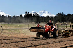 In this April 23, 2018 file photo, Trevor Eubanks, plant manager for Big Top Farms, readies a field for another hemp crop near Sisters, Oregon. Hemp is about to get the federal legalization that marijuana, its cannabis cousin, craves. That unshackling at the national level sets the stage for greater expansion in an industry seeing explosive growth through demand for CBDs, the non-psychoactive compound in hemp that many see as a way to better health.