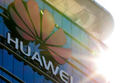 The logo of Huawei stands on its office building at the research and development centre in Dongguan in south China's Guangdong province, Tuesday, Dec. 18, 2018. While a top executive of Chinese tech giant Huawei faces possible U.S. charges over trade with Iran, the company's goal to be a leader in next-generation telecoms is colliding with security worries abroad. Australia and New Zealand have barred Huawei as a supplier for fifth-generation networks, joining the U.S. and Taiwan. Last week, Japan's cybersecurity agency said Huawei and other vendors deemed risky will be off-limits for government purchases.