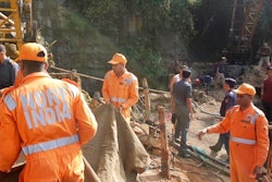 Rescuers work at the site of a coal mine that collapsed in Ksan, in the northeastern Indian state of Meghalaya, Friday, Dec. 14, 2018. Thirteen young miners were missing and feared dead following the collapse of a shaft and flooding of a coal mine they were digging illegally in India's remote northeast, police said Friday.