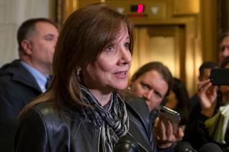 General Motors CEO Mary Barra speaks to reporters after a meeting with Sen. Sherrod Brown, D-Ohio, and Sen. Rob Portman, R-Ohio, to discuss GM's announcement it would stop making the Chevy Cruze at its Lordstown, Ohio, plant, part of a massive restructuring for the Detroit-based automaker, on Capitol Hill in Washington, Wednesday, Dec. 5, 2018.