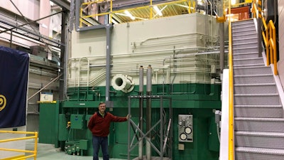 In this Nov. 29, 2018 photo, J.R. Biggs stands in front of the Transient Test Reactor he manages about 50 miles west of Idaho Falls, Idaho. The test reactor at the Idaho National Laboratory has been restarted to test nuclear fuels as the U.S. tries to revamp a fading nuclear power industry with safer fuel designs and a new generation of power plants.
