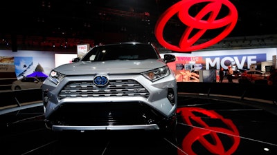 In this Nov. 28, 2018, file photo the 2019 Toyota RAV4 is displayed at the Los Angeles Auto Show in Los Angeles. Toyota's top U.S. executive says car sales nationwide have bottomed out and his company will keep making them despite a dramatic shift to trucks and SUVs. U.S. CEO Jim Lentz told the Detroit Economic Club Wednesday, Dec. 5, that car sales fell below 30 percent of sales last month, and he thinks that's close to the bottom.
