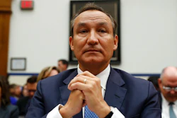 In this May 2, 2017 file photo, United Airlines CEO Oscar Munoz prepares to testify on Capitol Hill in Washington, before a House Transportation Committee oversight hearing. Munoz says his pilots don’t need any additional training on the new Boeing jet that is at the center of the investigation into a deadly crash in Indonesia. Munoz spoke to reporters Wednesday, Dec. 12, 2018 and said the Boeing 737 MAX is safe and reliable.