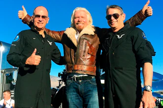 Richard Branson center celebrates with pilots Rick “CJ” Sturckow, left, and Mark “Forger” Stucky, right, after Virgin Galactic’s tourism spaceship climbed more than 50 miles high above California’s Mojave Desert on Thursday, Dec. 13, 2018. The rocket ship reached an altitude of 51 miles (82 kilometers) before beginning its gliding descent, said mission official Enrico Palermo. The craft landed on a runway minutes later.