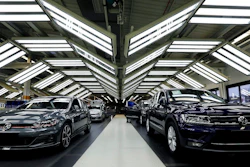 In this Thursday, March 8, 2018 file photo Volkswagen cars are pictured during a final quality control at the Volkswagen plant in Wolfsburg, Germany. Automaker Volkswagen says it is on track for a new annual sales record despite troubles getting vehicles certified for new European emissions tests.