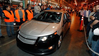 In a Dec. 7, 2009 file photo, Michigan Gov. Jennifer Granholm drives a pre-production Chevrolet Volt at the Hamtramck Assembly plant in Hamtramck, Mich. GMs' planned shutdown of its Detroit-Hamtramck plant would leave only one auto assembly factory in the city known for 'putting America on wheels,' but the closure and job losses are not expected to stall-out Detroit's remarkable comeback following its 2014 bankruptcy exit. GM wants to close four facilities in the United States and one in Canada.