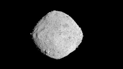 This Nov. 16, 2018, image provide by NASA shows the asteroid Bennu. After a two-year chase, a NASA spacecraft has arrived at the ancient asteroid Bennu, its first visitor in billions of years. The robotic explorer Osiris-Rex pulled within 12 miles (19 kilometers) of the diamond-shaped space rock Monday, Dec. 3. The image, which was taken by the PolyCam camera, shows Bennu at 300 pixels and has been stretched to increase contrast between highlights and shadows.