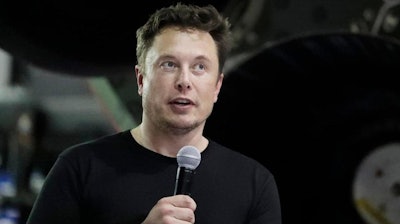 In this Sept. 17, 2018, file photo SpaceX founder and chief executive Elon Musk speaks in Hawthorne, Calif. Tesla CEO Elon Musk is dismissing the ability of the company’s new board chairwoman to exert control over his behavior.Musk says “it’s not realistic” to think that Robyn Denholm will be reining him in because he remains the electric car company’s largest shareholder. Musk spoke on CBS’ show “60 Minutes,” broadcast Sunday, Dec. 9, 2018.