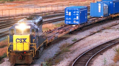 In this Sept. 29, 1994 file photo, a CSX Train with spent nuclear fuel passes through Florence, S.C., on its way to Savannah River Site Weapons Complex near Aiken S.C. Nevada is suing the federal government in a bid to stop plans to ship plutonium from South Carolina to a former U.S. nuclear proving ground north of Las Vegas. Outgoing Republican Gov. Brian Sandoval on Tuesday, Dec. 4, 2018, is again vowing that the state will fight the Department of Energy plan to store radioactive bomb-making material at the Nevada Nuclear Security Site.