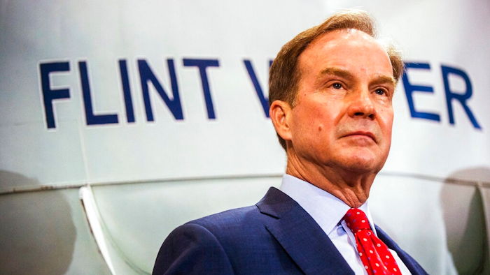 In this June 14, 2017 file photo, Michigan Attorney General Bill Schuette fields questions from reporters in Flint, Mich., after announcing charges against five water officials with manslaughter related to their alleged failure to act during the Flint water crisis. In 2016, Schuette promised to investigate the Flint water scandal “without fear or favor” and pledged that state regulators would be locked up for fudging data and misleading the public about lead in the poor city’s pipes. Yet three years later, no one is behind bars.