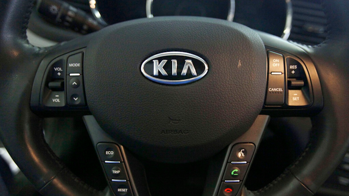 This Oct. 5, 2012, file photo, shows a Kia optima's steering wheel inside of a Kia car dealership in Elmhurst, Ill. Kia says it will ignore the partial U.S. government shutdown and recall more than 68,000 vehicles to fix a fuel pipe problem that can cause engine fires. The problem stems from previous recall repairs due to engine failures. Kia is only doing the fix on 68,000 of its 618,000 vehicles. The fuel injector pipe recall covers some 2011 through 2014 Optima cars, 2012 through 2014 Sorrento SUVs, and 2011 through 2013 Sportage SUVs, all with 2-liter and 2.4-liter four-cylinder engines.
