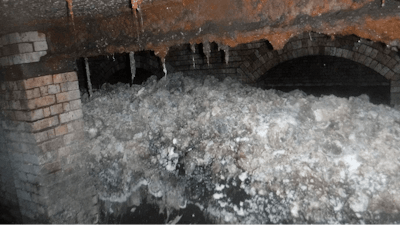 In this photo released Tuesday Jan. 8, 2019, by Britain's South West Water company, showing part of a 'fatberg', a mass of hardened fat, oil and baby wipes, measuring some 64 meters (210 feet) long, in the town of Sidmouth, England. The fatberg is blocking a sewer in the southwestern English town, and will take a sewer team around eight weeks to dissect and dispose of the obstruction.