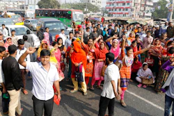 Bangladeshi garment workers participate in a protest in Savar, on the outskirts of Dhaka, Bangladesh, Wednesday, Jan. 9, 2019. Thousands of garment workers have staged demonstrations to demand better wages for the fourth straight day, shutting down factories on the outskirts of Bangladesh's capital. Bangladesh has the second-largest garment-export industry in the world after China and makes clothes for big-name retailers.