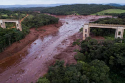 An aerial view shows a collapsed bridge caused by flooding triggered by a dam collapse near Brumadinho, Brazil.