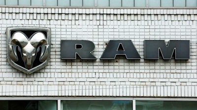 This Jan. 12, 2017, file photo shows the Ram logo at a Chrysler dealership in Pittsburgh. Fiat Chrysler is recalling nearly 180,000 pickup trucks in North America to fix an electrical problem that can knock out the power steering. The recall covers Ram 1500 pickups from the 2019 model year. Most are in the U.S. and one-third are still on dealer lots.