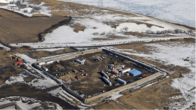 This Feb. 13, 2017, aerial file photo shows a site where the final phase of the Dakota Access Pipeline where it crosses beneath the Missouri River in North Dakota, just north of the Standing Rock Reservation in Emmons County in Cannon Ball, N.D. A federal judge is allowing four Native American tribes in the Dakotas to challenge the recent conclusion of federal officials that a Dakota Access oil pipeline spill wouldn't unfairly affect them, further prolonging a court case that has lingered for more than two years.