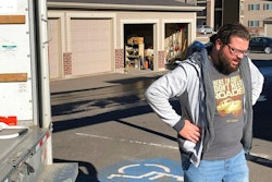 George Jankowski, a furloughed U.S. Department of Agriculture worker, helps a friend move out of an apartment in Cheyenne, Wyo., Monday, Jan. 14, 2019. Jankowski was paid $30 for his help. Many federal workers are doing odd jobs or driving for ride-hailing apps to help make ends meet during the partial federal government shutdown.