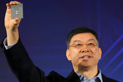 William Xu, director, chief strategy marketing officer, chairman of the Investment Review Board of Huawei, displays a processor chip during an unveiling ceremony in Shenzhen, China, Monday, Jan. 7, 2019. Chinese telecom giant Huawei unveiled a processor chip for data centers and cloud computing as it expands into an emerging global market despite Western warnings the company might be a security risk.