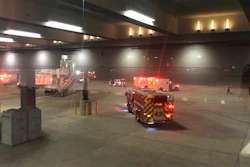 This photo provided by Lynn Krugman and taken through a window shows emergency personnel responding after an 'equipment failure' involving a jet bridge at Baltimore-Washington International Thurgood Marshall Airport, Saturday, Dec. 29, 2018, in Baltimore. Officials say several people were injured.