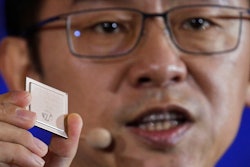 Ryan Ding, chief of Huawei's carrier business group, holds a Tiangang 5G base station chipset, speaks during a product presentation in Beijing, Thursday, Jan. 24, 2019. Chinese tech giant Huawei announced plans to release a next-generation smartphone based on its own technology instead of U.S. components, stepping up efforts to compete with global industry leaders.