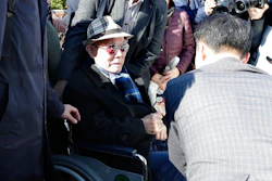 In this Oct. 30, 2018, file photo, South Korean Lee Chun-sik, 94-year-old victim of forced labor during Japan's colonial rule of the Korean Peninsula before the end of World War II, sits on a wheelchair upon his arrival at the Supreme Court in Seoul, South Korea. Lawyers for South Koreans forced into wartime labor have taken legal steps to seize the South Korean assets of a Japanese company they are trying to pressure into following a court ruling to provide them compensation.