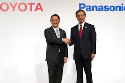 In this Dec. 13, 2017, file photo, Toyota Motor Corporation President Akio Toyoda, left, and Panasonic Corporation President Kazuhiro Tsuga, right, pose for photographers after a joint press conference in Tokyo. Toyota Motor Corp. and Panasonic Corp. said in a joint statement Tuesday, Jan. 22, 2019, they are setting up a joint venture to research, manufacture and sell batteries for ecological autos, an increasingly lucrative sector amid concerns about global warming.