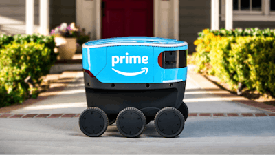 This undated photo provided by Amazon shows a self-driving delivery robot that Amazon is calling Scout. The online shopping giant says it started to test self-driving robots in Snohomish County, Wash., Wednesday, Jan. 23, 2019, that can bring Amazon packages to shoppers' doorsteps.