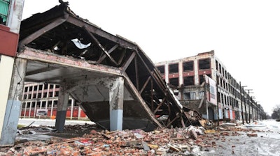 The pedestrian bridge that once was part of a Packard auto assembly plant collapsed on Wednesday, Jan. 23, 2019.