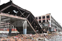A pedestrian bridge that once was part of a Packard auto assembly plant has collapsed, leaving a pile of rubble in Detroit, Mich., on Wednesday, Jan. 23, 2019. The city says no injuries were reported.