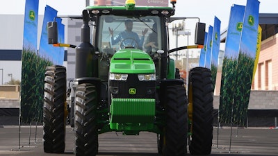 John Deere has hauled in a self-driving tractor aided by cameras with computer-vision technology to track the self-driving precision and program the route to be driven, shown at CES International Tuesday, Jan. 8, 2019, in Las Vegas.