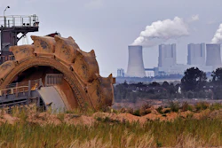 In this photo taken Aug. 27, 2018 bucket wheel digs for coal near the Hambach Forest near Dueren, Germany.