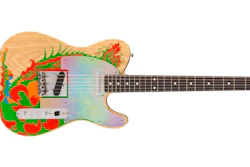 This image released by Fender shows a recreation of a Telecaster guitar that Jimmy Page once painted with a dragon, a long-lost piece of six-string history that marked the guitar hero’s last days in the Yardbirds and first days in Led Zeppelin. Fender craftsman Paul Waller, who worked with Page to reboot the dragon, says it represents “a pivotal moment for the guitar and for music.”