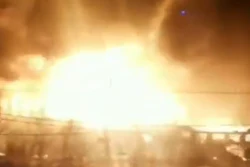 A still from a video taken by local EMS as they pulling up to assist the 8-alarm fire at the Marcal Paper Company in Elmwood Park, New Jersey.