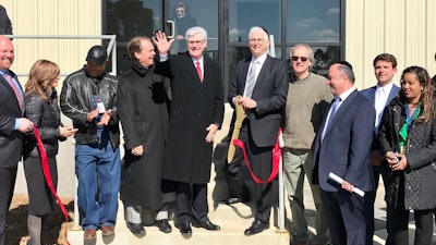 Gov. Phil Bryant (center) attended the ribbon cutting ceremony Tuesday. Geri-Care is set to hire about 200 new employees.